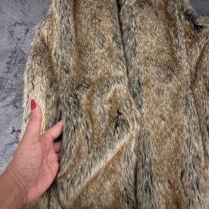 Faux fur knee length vest